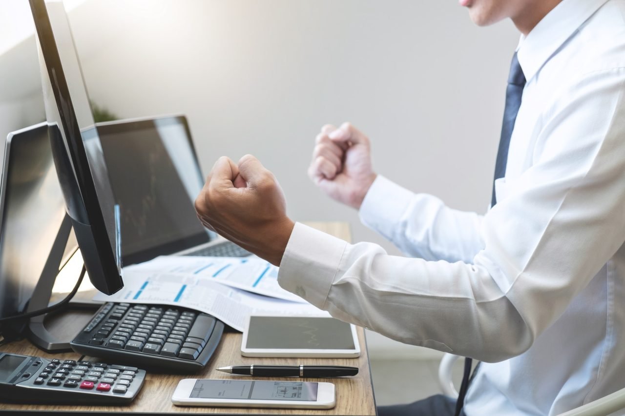 Businessman trading stocks online