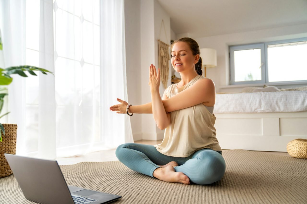 woman is doing yoga